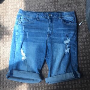 Ripped blue Jean shorts